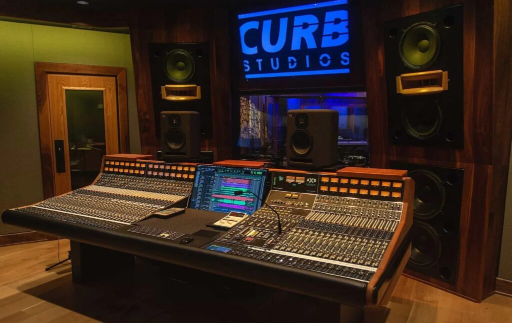 API Legacy AXS flagship analog mixing console in a flagship recording studio control room setup