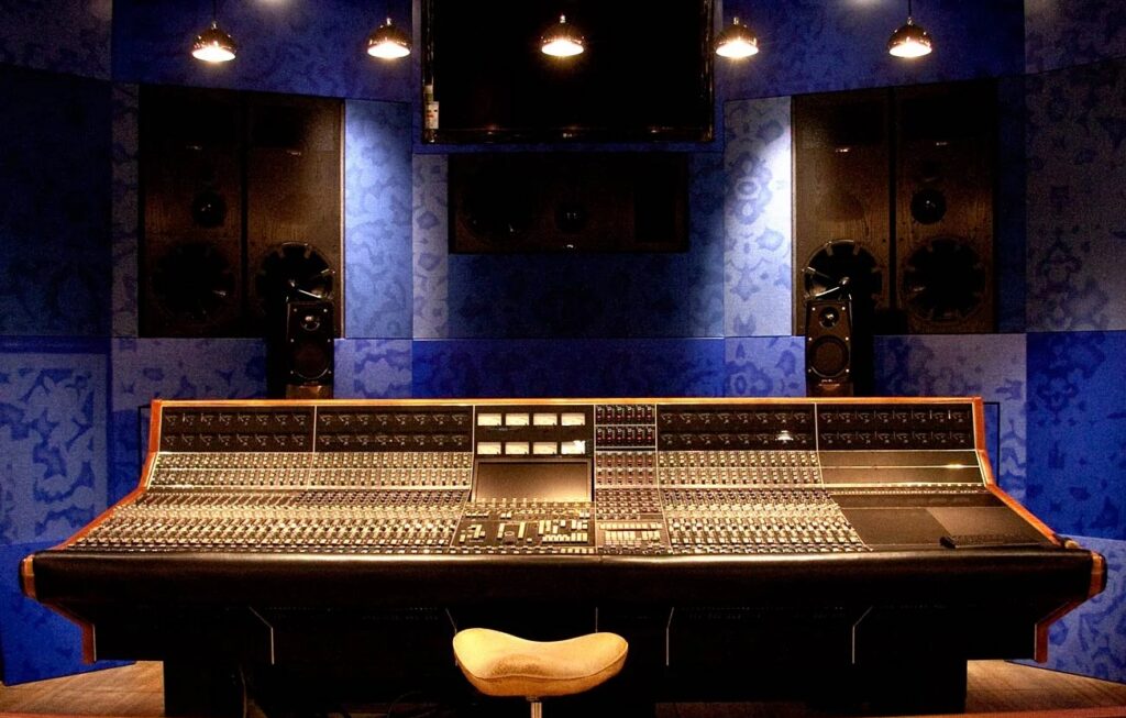 API Vision flagship analog mixing console as the anchor of a pro recording studio setup
