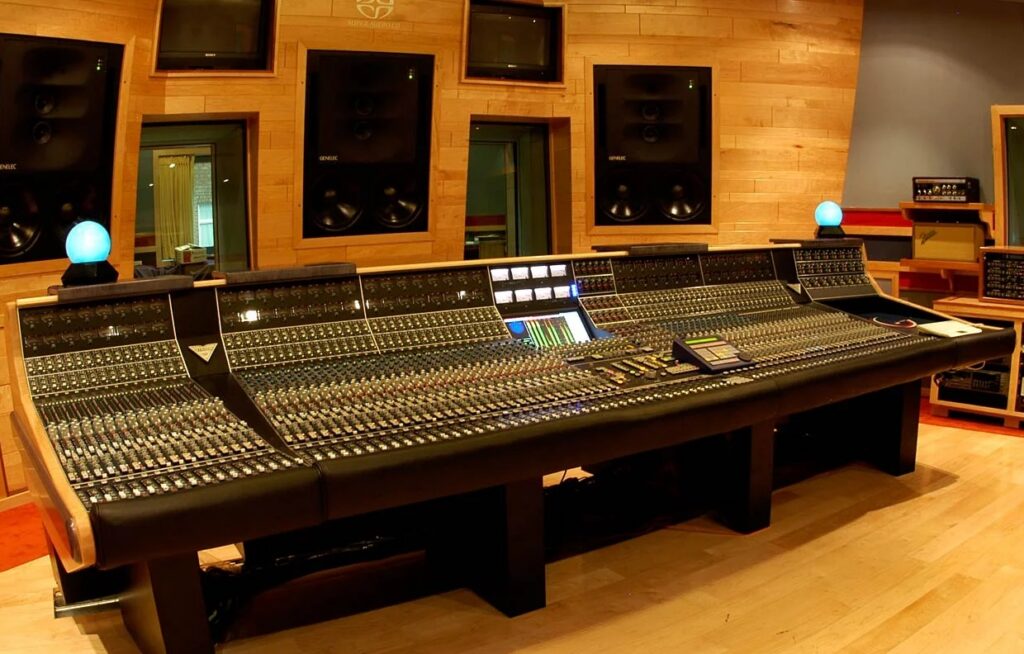 API Vision large-format discrete analog mixing console in a professional recording studio