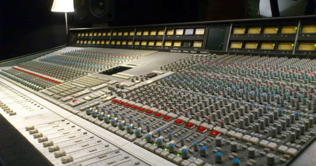 SSL 4000 series analog mixing console centre section in a pro recording studio