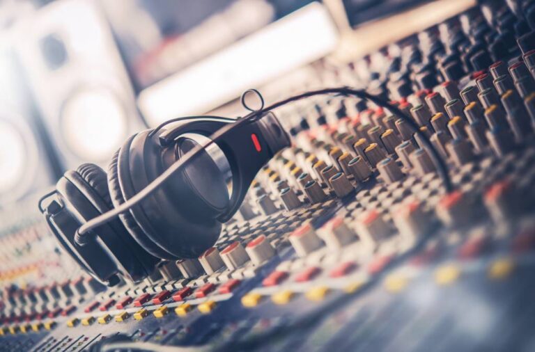 Pro mixing console showing channel strips that require regular fader and switch maintenance